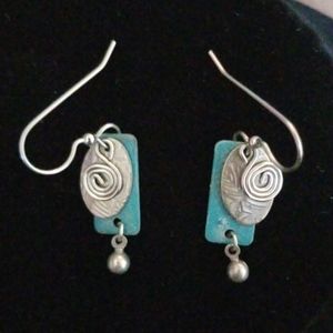 Green and silver color earrings